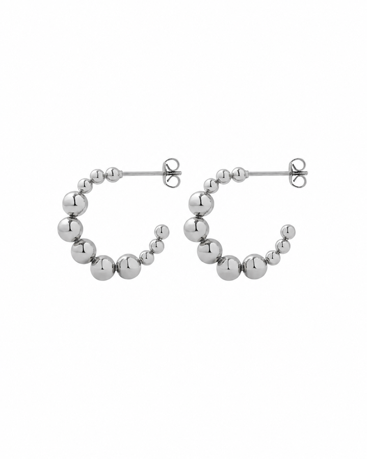 Pair of open hoops formed from graduated 2mm to 5mm beads in a polished silver finish